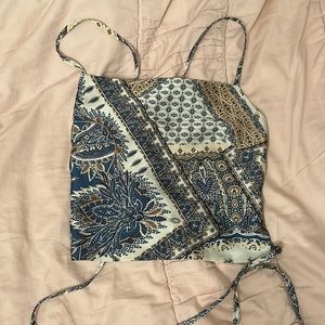 Open-back tie top. Handkerchief style. Really pretty on